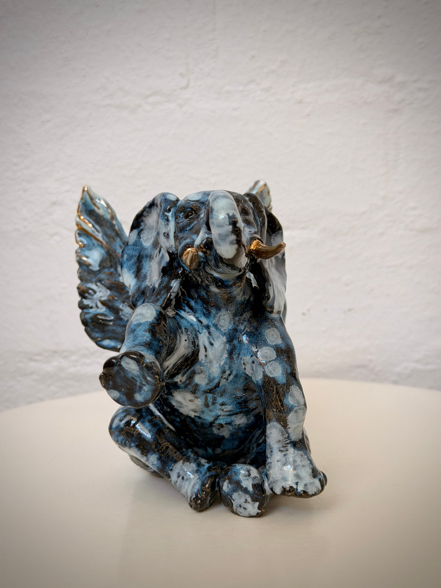 Winged sitting elephant