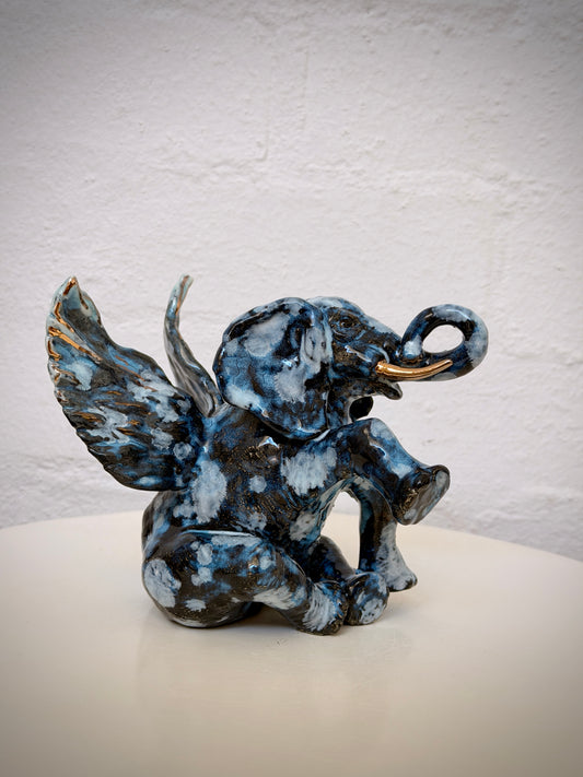 Winged sitting elephant