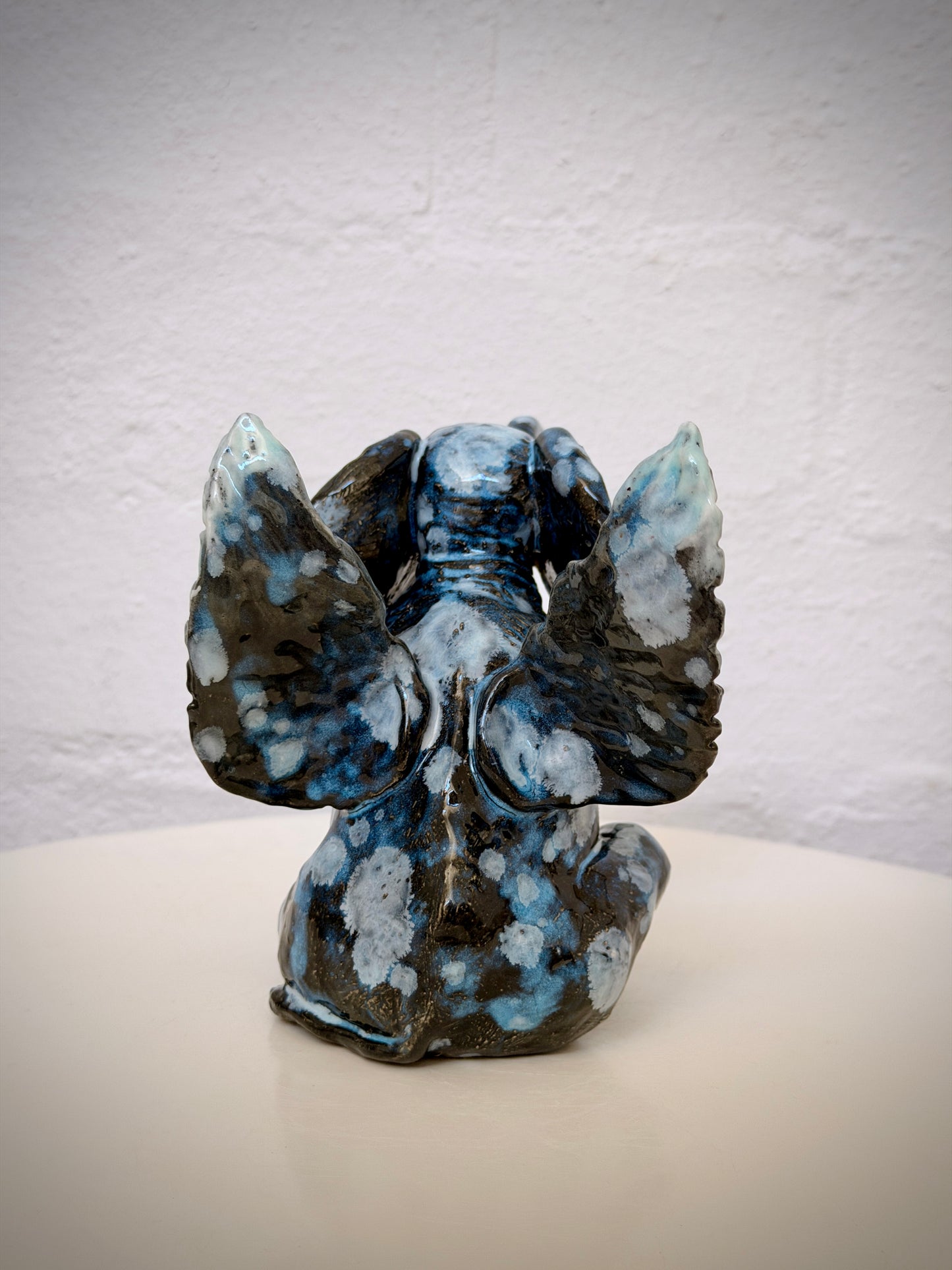 Winged sitting elephant