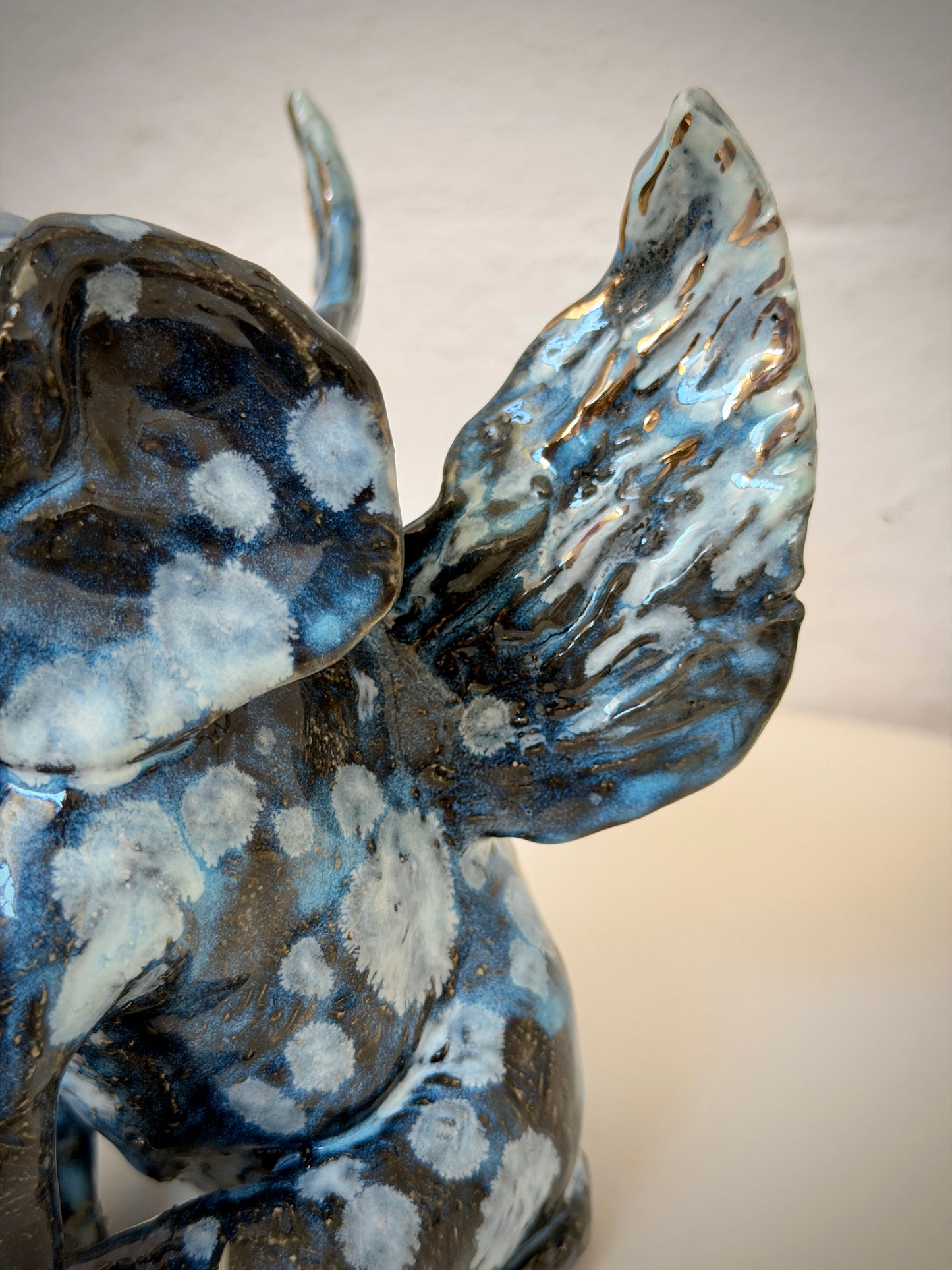 Winged sitting elephant