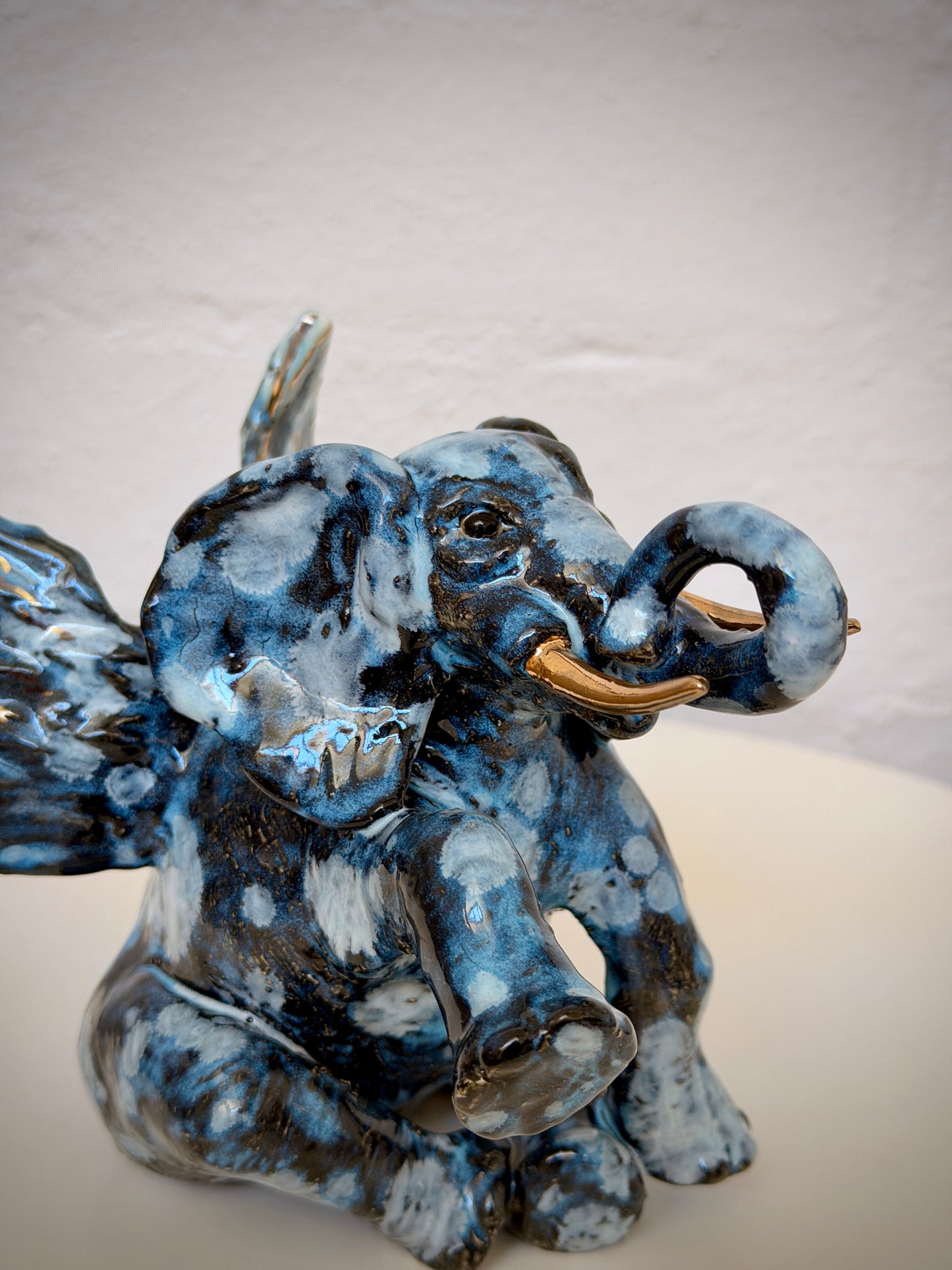Winged sitting elephant