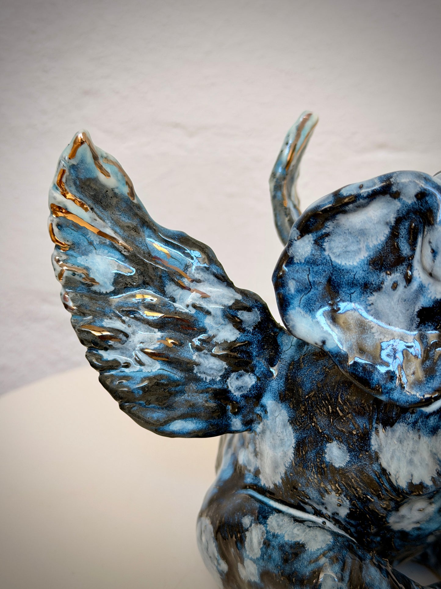 Winged sitting elephant